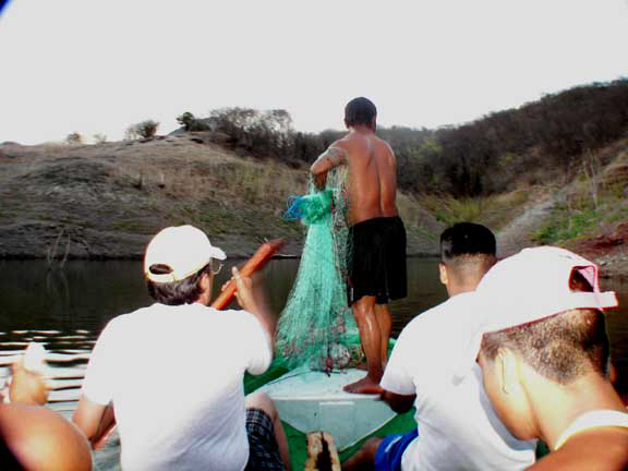 Librado preparing to throw fishing net