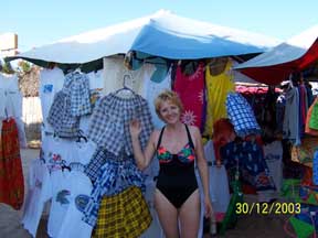 Lots of vendor booths on the beach to buy shirts, swim suits etc. at